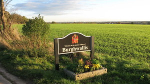 Welcome sign at the entrance to the village