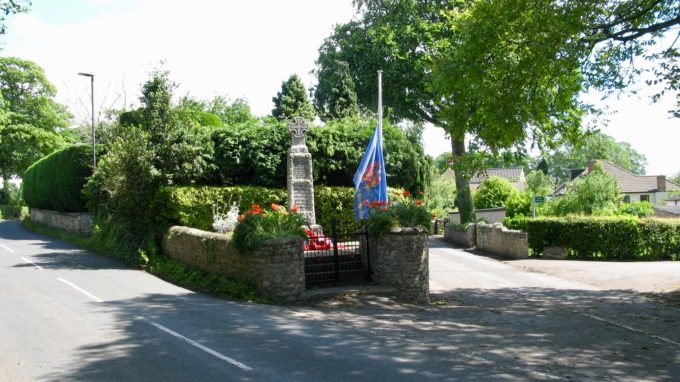 war memorial flag at half mast